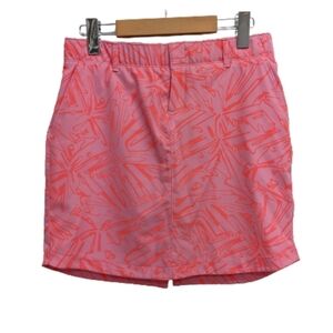 Under Armour Women's Links Woven Printed pink and orange skort size 4